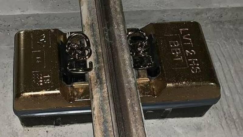 A Sleeper made of gold is being installed.